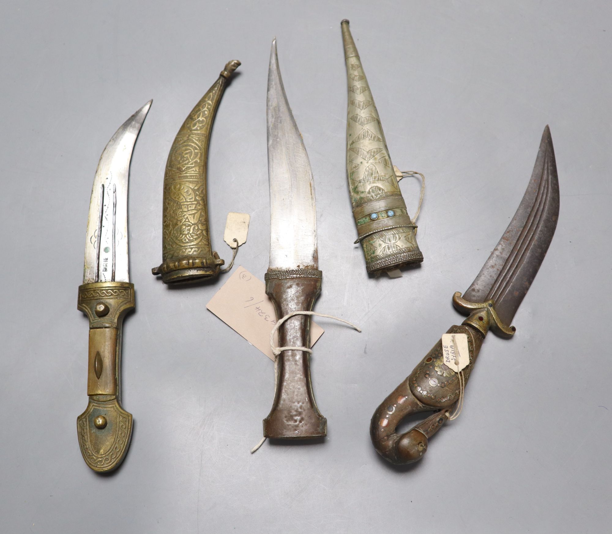 Two Syrian daggers, a Jordanian dagger and a shield